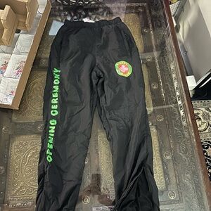 Disney Black Sweatpants with Bright Green Logo and Side Lettering